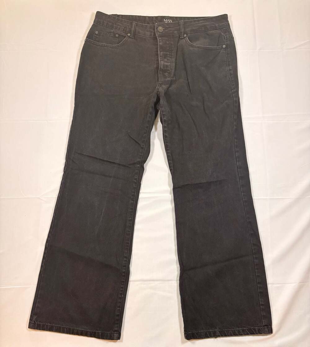 Men’s boohooMAN Tall Baggy Rigid Jeans in Washed Black
